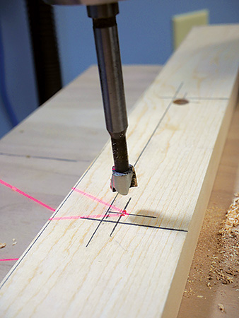 Cutting drill press fence opening with Forstner bit