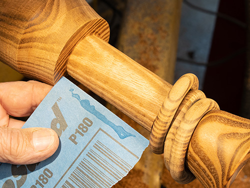 Attaching sandpaper to stem of turned goblet