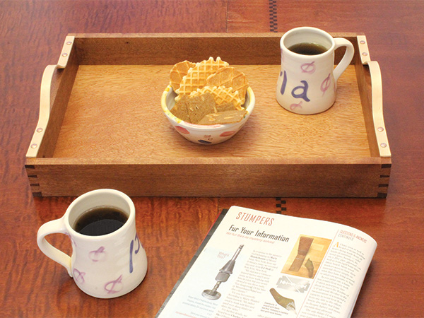 Serving tray with curved handles
