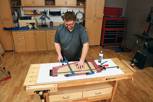 Gluing purpleheart shelf trim to rounded shelf panel