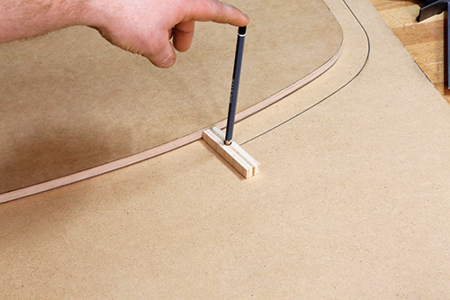 Tracing template shape with scribing jig