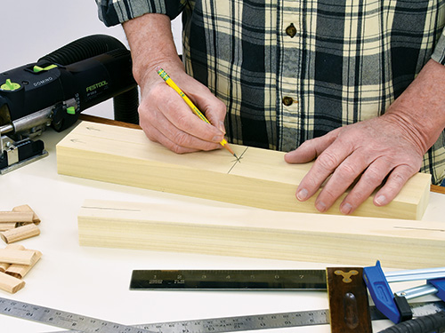 Marking piece of wood where you want to make slot cut