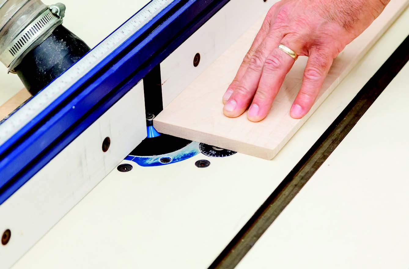 The outer top and bottom edges of the case pieces have 45° chamfers to dress them up. Make these cuts at the router table with a piloted chamfering bit.