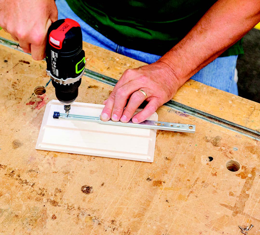 Then drill pilot holes in the side panels.