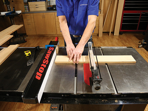 Using stand-off block to guide rail cut