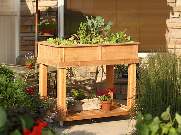 Outdoor patio planter with wheels