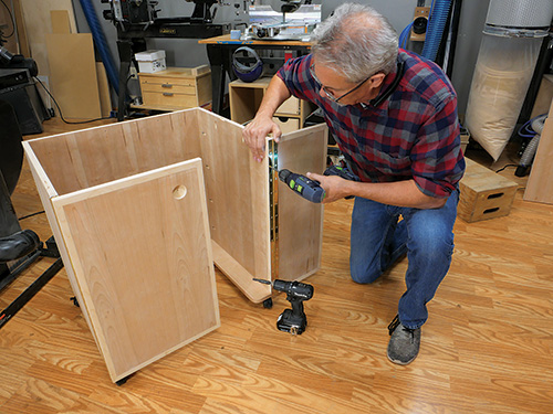 Attaching piano hinges to sewing cabinet door