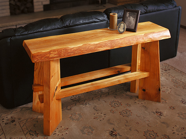 Table made with rough ash wood lumber