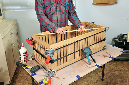 Band clamps hold the frame subassemblies together during glue-up.