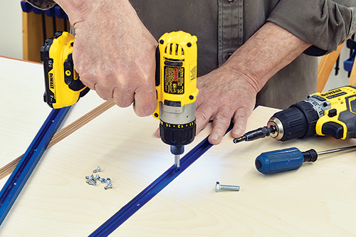 Screwing t-track slots down on crosscut sled